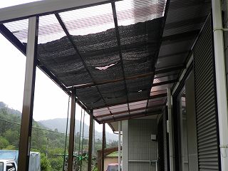 Installation photograph of sunshade for aluminum terrace